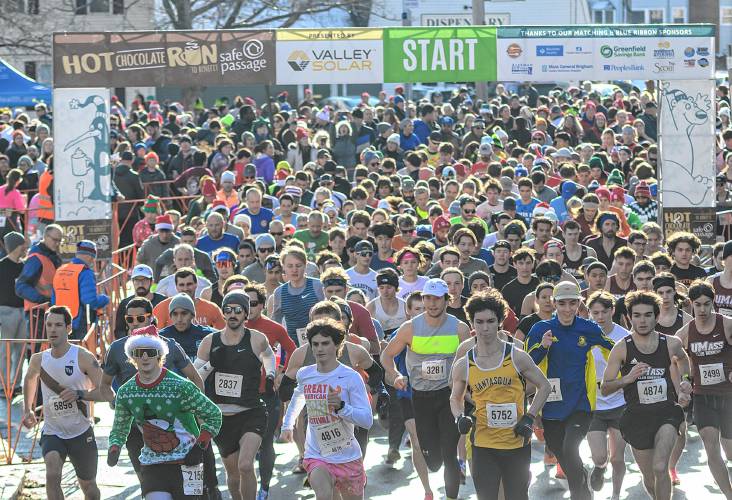 Thousands of runners participate during Safe Passages 21st annual Hot Chocolate Run in downtown Northampton on Sunday, December 8, 2024. Photo by Christopher Evans